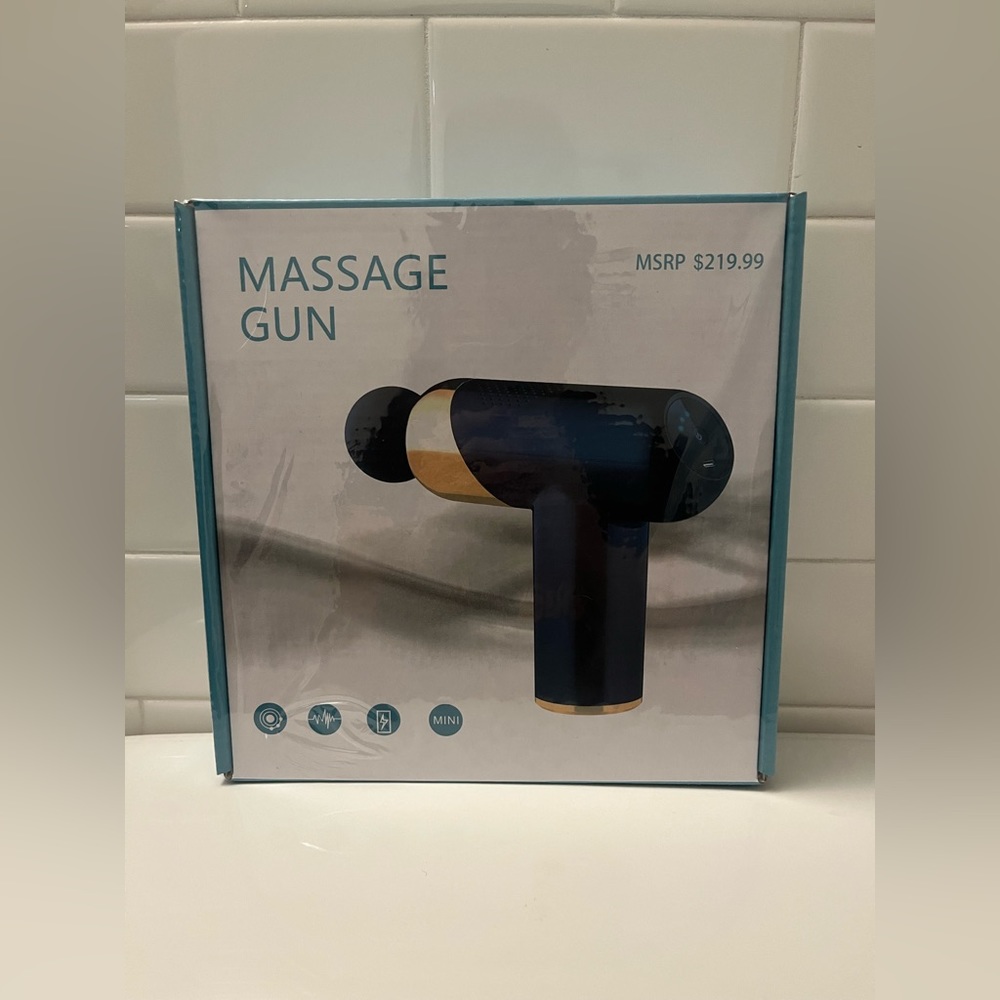 Massage gun NEW black and gold
